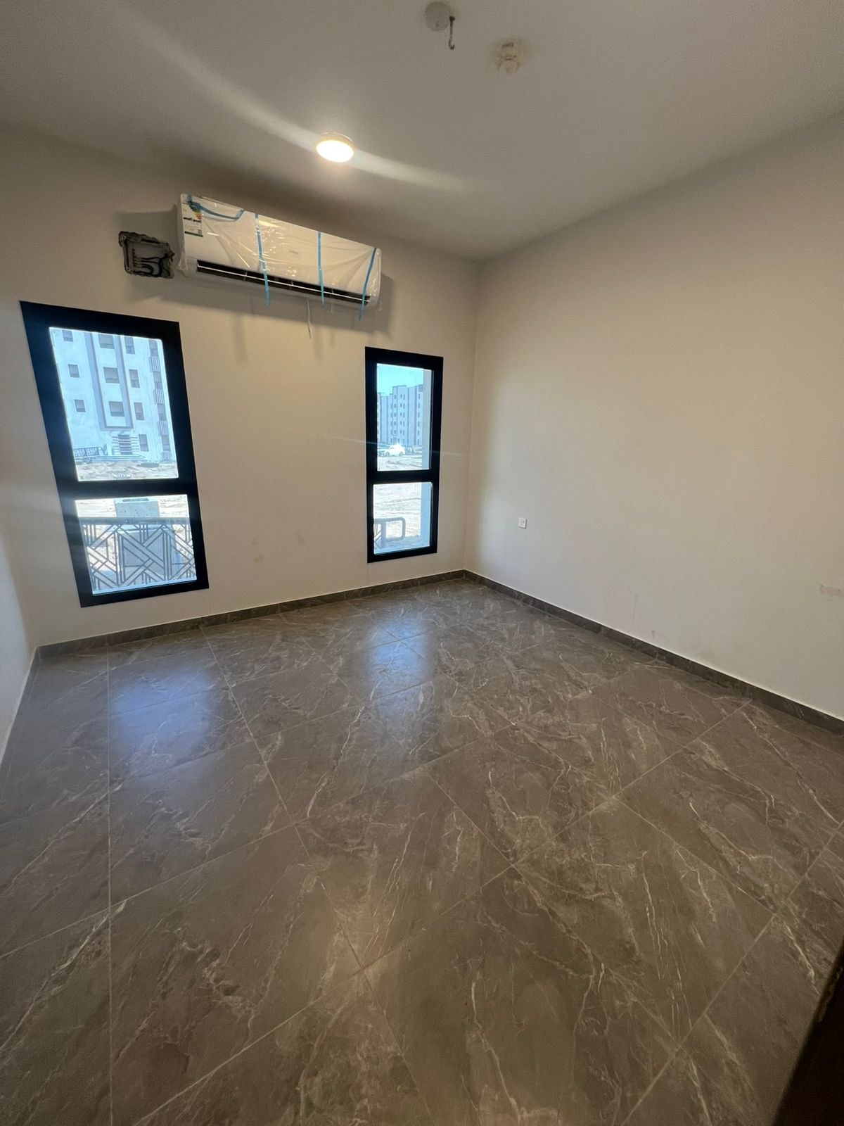 Al-Hawiyah — Living area · Windows & finishes